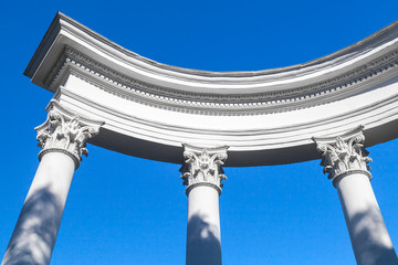 White columns and portico under blue sky