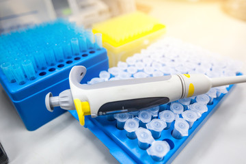 Micropipette in laboratory. Science equipment.
