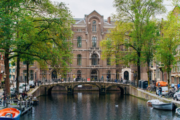 Fototapeta na wymiar Amsterdam, Netherlands September 5, 2017 : Streets, canals and architecture of Amsterdam. Netherlands