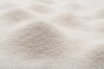 White sugar texture, sweet background with copy space © Prostock-studio