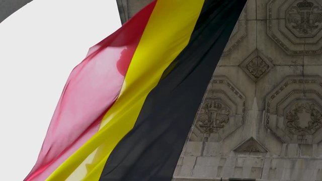 Belgium flag waving from Arcade du Cinquantenaire