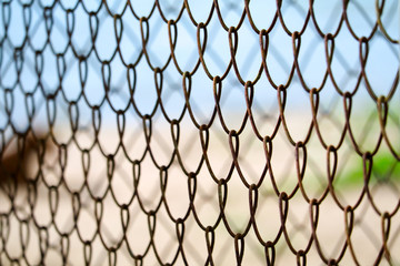 Steel wire fence to prevent dangerous areas along the beach