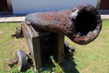 Old cannon of war. Deteriorated. history file.