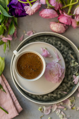 Spring mockup with a cup of coffee and flowers