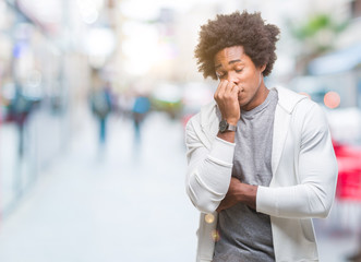 Afro american man wearing sweatshirt over isolated background looking stressed and nervous with hands on mouth biting nails. Anxiety problem.