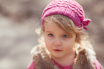 Portrait of beautiful pretty young girl in spring park