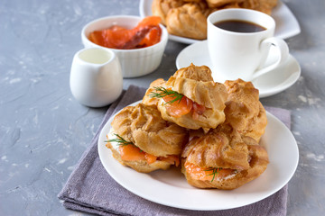 Profiteroles with cheese and trout.
