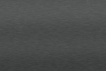 Brushed dark metal texture.
