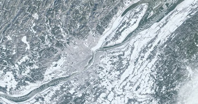 Hurtling toward earth, out of control, over Quebec City, Canada. Vibration and camera shake. Elements of this image furnished by NASA