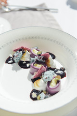 tasty dessert on a plate in violet tones