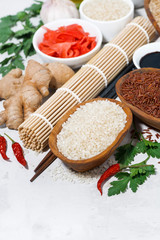 products for Japanese cuisine, rice, ginger, soy sauce and spices, top view