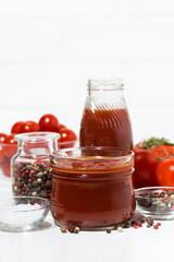 Products made with fresh tomato - sauce, juice and seasonings, vertical