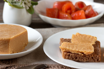 Traditional Norwegian breakfast, sandwiches with brown cheese brunost.