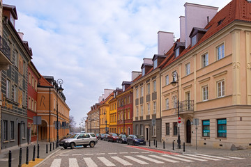 Warsaw, Poland - Typical old town street with XIX century tenements - Koscielna street - in Starowka historic quarter in Warsaw © Art Media Factory
