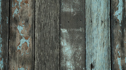 Texture or background of yellow, green and blue pained and plain wood wall, economic design from...