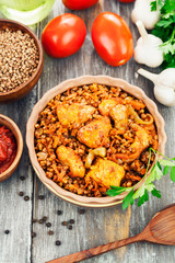 Buckwheat porridge with meat and tomato sauce