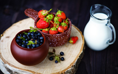 Blueberries and strawberries harvesting dessert