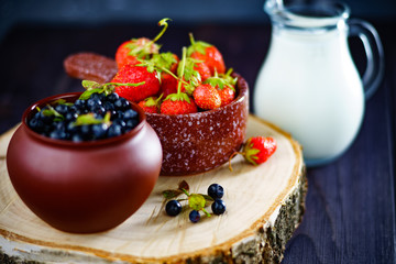 Blueberries and strawberries harvesting dessert