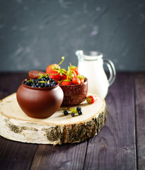 Blueberries and strawberries harvesting dessert