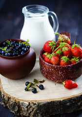 Blueberries and strawberries harvesting dessert