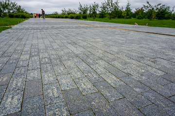 Way with stone slabs in Koknese park Garden of Destinies in Latvia.