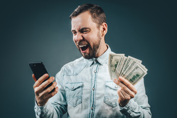 Man celebrating victory after making bets at bookmaker website