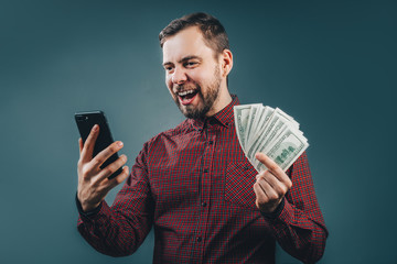 Man celebrating victory after making bets at bookmaker website