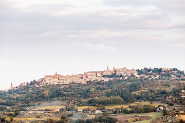 Fototapeta na wymiar Far away view of the medieval town of Montepulciano in Italy