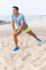 Man training on beach