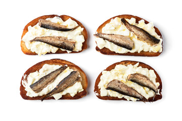 Sandwich with sprats, eggs and mayonnaise isolated on white background.