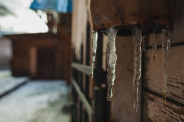 a gully with icicles on an tube