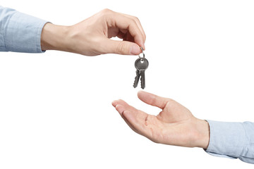 Hands of two people, giving and taking keys, isolated on white background