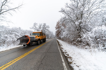 yellow dumptruck snowplow