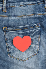 Red heart in jeans pocket. Valentines day concept. 