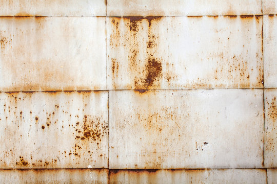 rusty metal garage wall in winter