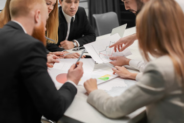 Employees having meeting in office. Financial trading concept