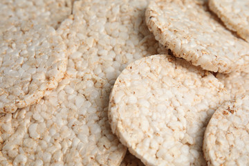 Many crunchy rice cakes as background, closeup