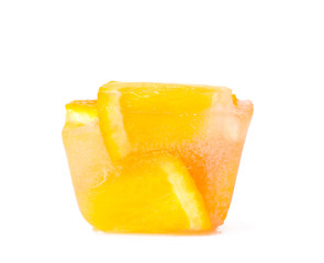 Ice cube with orange slices on white background