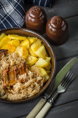 Fried ribs in sauerkraut.