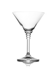 Empty crystal martini glass on white background