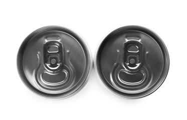 Top view of aluminum cans with beverage on white background