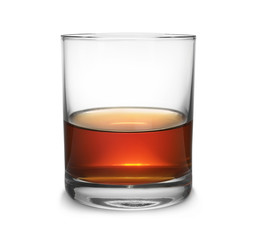 Glass of scotch whiskey on white background
