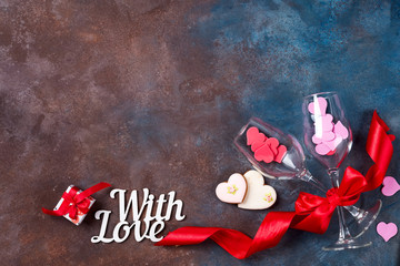 Stone background with red hearts, gifts and letters. The concept of Valentine Day.