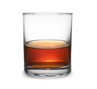 Glass of scotch whiskey on white background