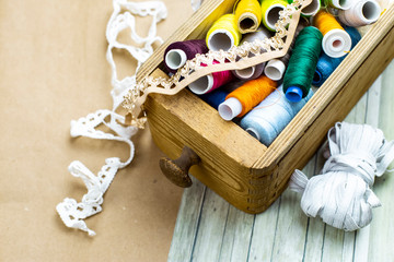 Colored Threads in a wooden box