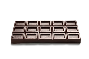 Tasty dark chocolate bar on white background