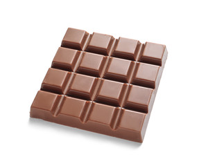 Tasty milk chocolate bar on white background
