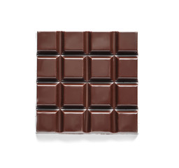Tasty dark chocolate bar on white background, top view