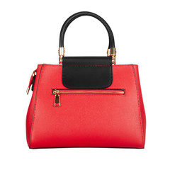 Red women's leather bag with black top isolated on white