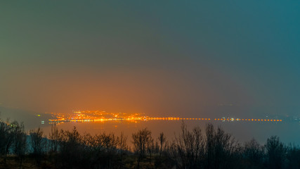the lights of a village photographed over the Danube